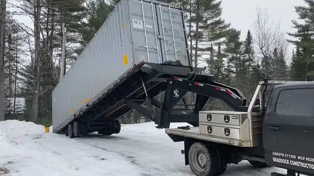 tilt bed roll off shipping container delivery